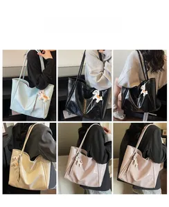 Detail showing high-capacity shoulder bags in four colors with small horse charms
