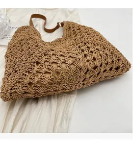 Detailed close-up of brown hollow woven texture and premium soft shoulder strap