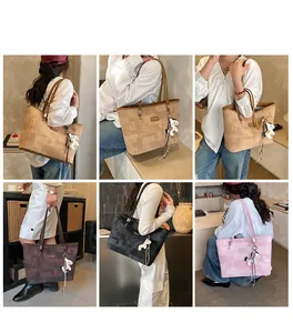 Detailed views of vintage textured tote bags with charms and elegant shoulder straps