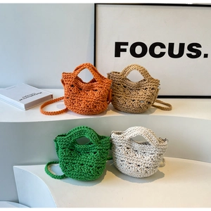 Detailed close-up of handmade crochet hollow woven bags in four vibrant seasonal colors