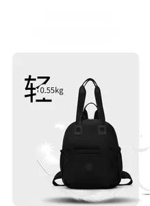 Lightweight black commuter backpack weighing 0.55kg with water-resistant fabric details