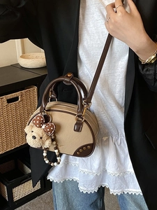 Chic retro brown Boston crossbody bag with plush bear charm and pearl accessories