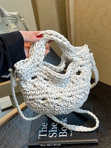 Handcrafted white woven cotton rope crossbody bag with hollow-out pattern for beach vacation