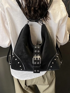 Cool rivet studded black leather backpack tote for women with punk metal eyelet buckle