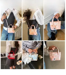 Close-up of checkered bucket bags in pink, red, and blue with heart charms