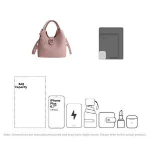 Detail view of pink leather bucket bag capacity with storage space for gadgets