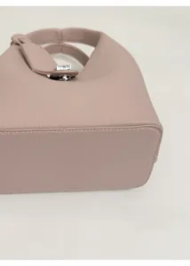 Detail of lychee pattern leather bucket bag showing thickened base and fine stitching