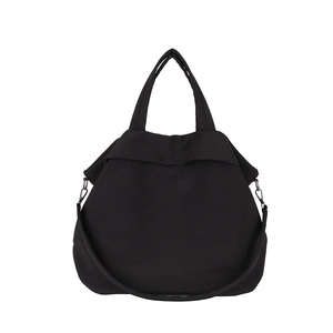 Grand sac fourre-tout minimaliste en nylon noir avec doubles poignées et bandoulière
