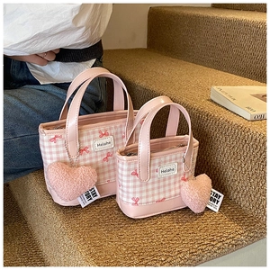 Pink checkered mini tote bags with red bow prints and plush heart charm detail