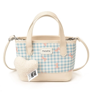 Blue and white checkered mini bucket bag with pink bow print and plush heart charm