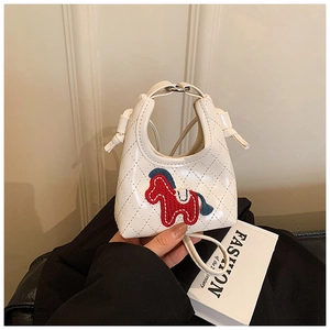 Close-up of a mini white quilted handbag featuring a cute colorful pony embroidery