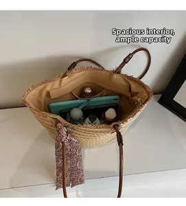 Top view of large straw tote bag showing spacious interior with liner and printed scarf