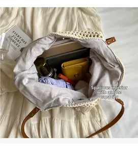 Macro shot of large capacity straw tote bag with spacious interior and magnetic closure