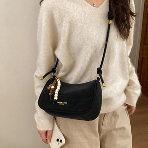 Retro black faux suede hobo bag with wood bead tassel and rope shoulder strap