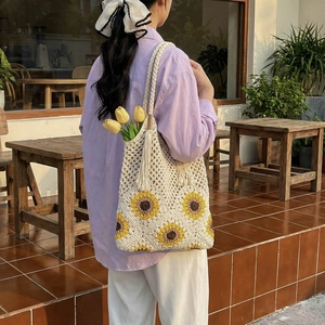Fashionable woven crochet sunflower tote bag with fringes for summer beach vacation style