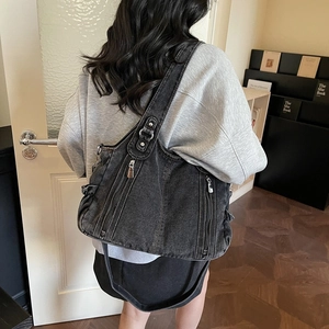 Retro charcoal grey washed denim tote bag with multiple zip pockets and wide shoulder strap