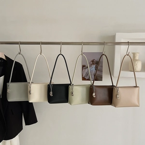 Minimalist leather underarm bags for women in six colors with silver chain detail