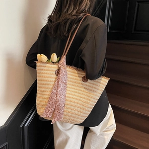 Large capacity striped straw tote bag with brown leather straps and paisley scarf decoration