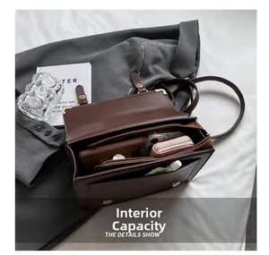 Detailed top view showing internal capacity of the brown vintage leather satchel bag