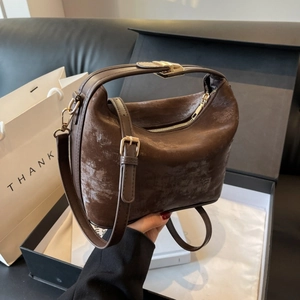Vintage brown PU leather handbag with adjustable crossbody strap and golden hardware