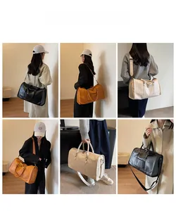 Detailed views of high-capacity vintage travel bags in black, caramel, and cream finishes