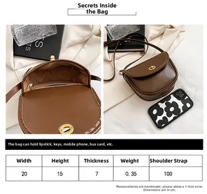 Detailed size specifications for the brown retro saddle bag with a mobile phone comparison