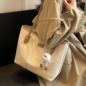 Large Capacity Water Ripple Textured Tote Bag For Women Fashion Commuter Shoulder Bag With Plush Monster Charm PU Leather Handbag