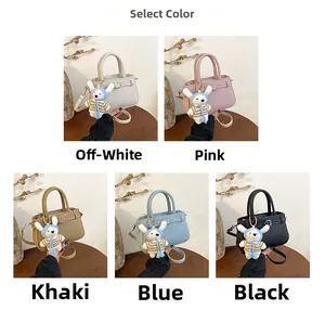 Litchi pattern bucket bags in five colors with cute teddy bear charms and long straps