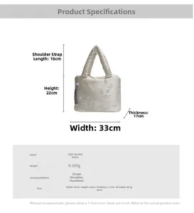 Detailed size chart of the cream embroidered tote bag showing 33x22x17cm dimensions