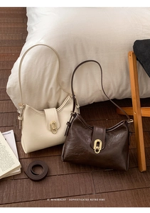 Minimalist retro shoulder bags in beige and dark brown leather with oval gold buckles