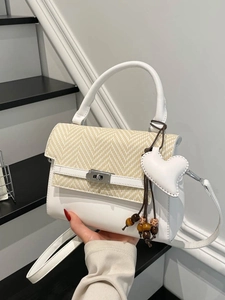 Minimalist white leather and woven fabric crossbody bag with heart charm for women