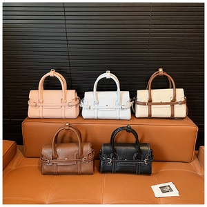 Detail showing high-quality matte leather handbags in five elegant colors and textures