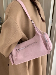 Pink suede dumpling style handbag with multi-zippers and rivet details for women