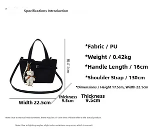 Size chart showing black bucket bag dimensions: 22.5cm width and 17.5cm height