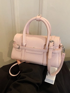 Elegant light pink PU leather structured handbag with silver buckle and detachable shoulder strap