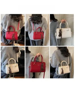 Detailed views of vintage crossbody bag in red and beige showing straps and silk scarf
