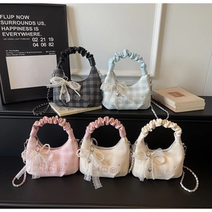 Detailed collection of checkered crossbody bags with ruffle handles and lace bow charms