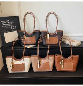 Detailed collection of five vintage textured tote bags in contrast colors and pebble leather