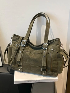 Retro dark green matte leather tote bag with vintage industrial style and silver buckles