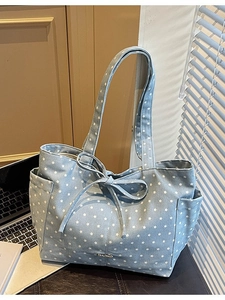 Light blue canvas tote bag with white star pattern and decorative bow for women