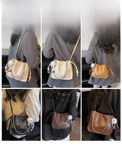 Detailed view of women's pleated cloud bags with chain straps in six diverse colors