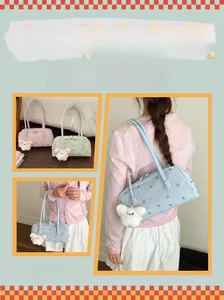 Close-up of floral commuter underarm bags in pink and blue with plush bunny charms