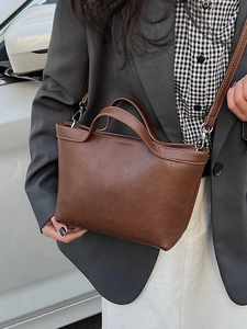 Minimalist large capacity dark brown tote bag with double handles and detachable strap