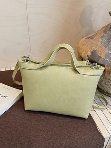 Minimalist avocado green large capacity tote bag with top handles and crossbody strap