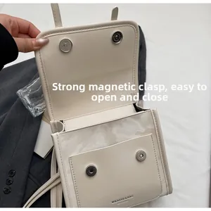 Close-up of beige PU leather backpack interior with magnetic snaps and small inner pocket