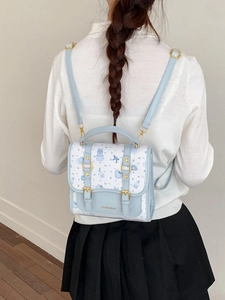 Cute light blue and white school backpack with cartoon bear prints and gold hardware