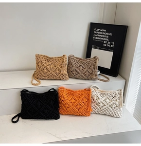 Detailed view of handmade woven crossbody bags with tassel accents in five colors