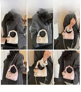 Detail showing white and pink PU leather crossbody bags with plaid bear pendants