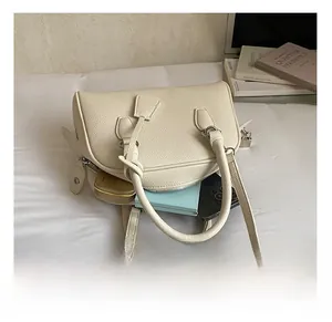 Top view of cream white pebbled leather bowling bag interior showing large capacity