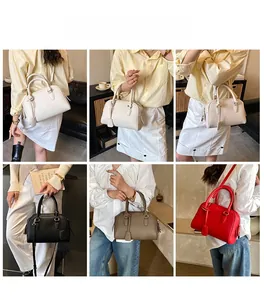 Model showcasing various ways to carry the stylish lychee texture leather bowling bag